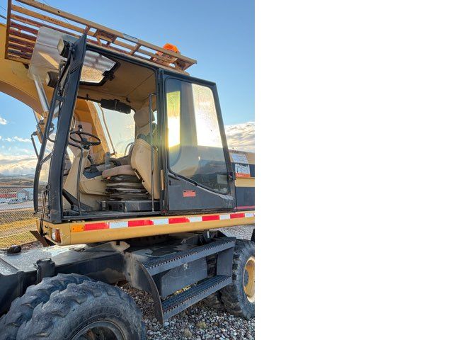 1999 Caterpillar M318 Excavator