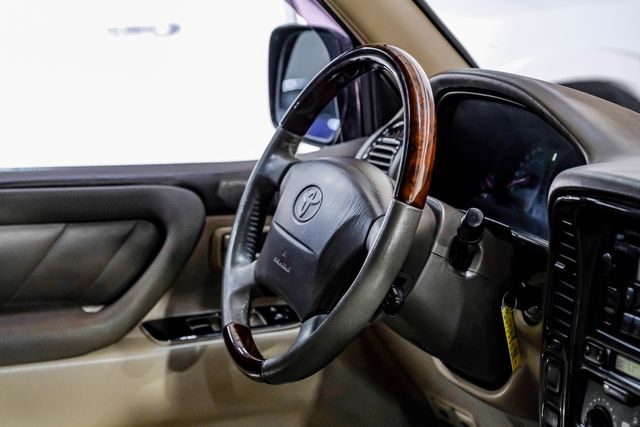 1999 Toyota Land Cruiser Locking Rear Diff 3RD ROW Leather LIFTED 33" A/T | Dallas, TX | East Dallas Diesel 1999 Toyota Land Cruiser Locking Rear Diff 3RD ROW Leather LIFTED 33" A/T | Dallas, TX | East Dallas Diesel