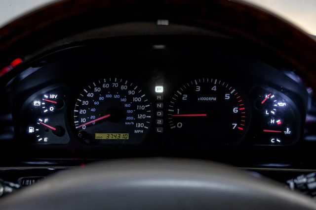 1999 Toyota Land Cruiser Locking Rear Diff 3RD ROW Leather LIFTED 33" A/T | Dallas, TX | East Dallas Diesel 1999 Toyota Land Cruiser Locking Rear Diff 3RD ROW Leather LIFTED 33" A/T | Dallas, TX | East Dallas Diesel