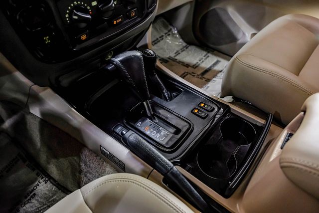 1999 Toyota Land Cruiser Locking Rear Diff 3RD ROW Leather LIFTED 33" A/T | Dallas, TX | East Dallas Diesel 1999 Toyota Land Cruiser Locking Rear Diff 3RD ROW Leather LIFTED 33" A/T | Dallas, TX | East Dallas Diesel