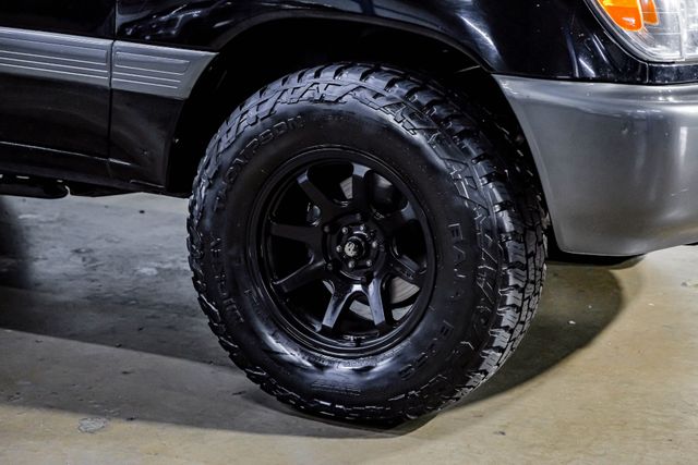 1999 Toyota Land Cruiser Locking Rear Diff 3RD ROW Leather LIFTED 33" A/T | Dallas, TX | East Dallas Diesel 1999 Toyota Land Cruiser Locking Rear Diff 3RD ROW Leather LIFTED 33" A/T | Dallas, TX | East Dallas Diesel