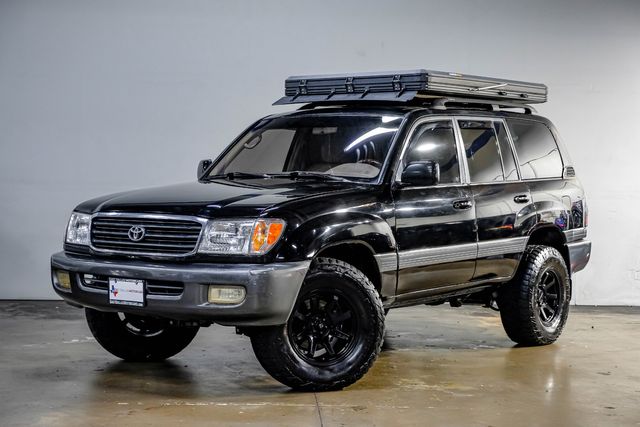 1999 Toyota Land Cruiser Locking Rear Diff 3RD ROW Leather LIFTED 33" A/T | Dallas, TX | East Dallas Diesel 1999 Toyota Land Cruiser Locking Rear Diff 3RD ROW Leather LIFTED 33" A/T | Dallas, TX | East Dallas Diesel