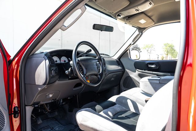 2004 Ford F-150 SVT Lightning Rare 1 Owner with 12,761 Original Miles | Dallas, TX | RPM Garage 2004 Ford F-150 SVT Lightning Rare 1 Owner with 12,761 Original Miles | Dallas, TX | RPM Garage