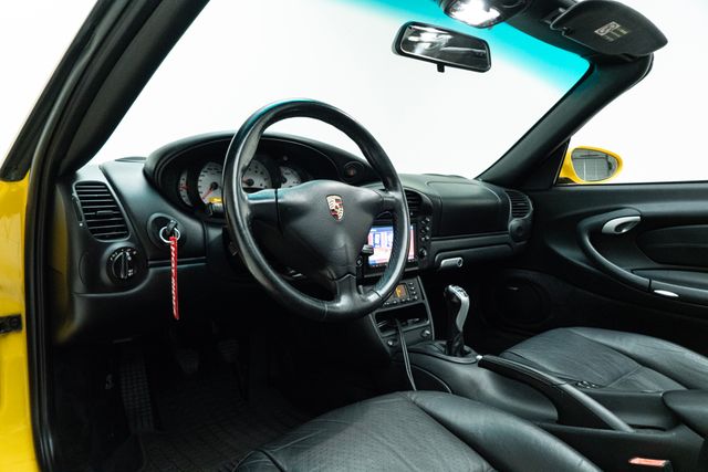 2004 Porsche 911 Carrera 996.2 Cabriolet 6-Speed in Speed Yellow | Carrollton, TX | Texas Hot Rides 2004 Porsche 911 Carrera 996.2 Cabriolet 6-Speed in Speed Yellow | Carrollton, TX | Texas Hot Rides