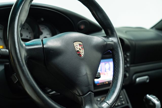 2004 Porsche 911 Carrera 996.2 Cabriolet 6-Speed in Speed Yellow | Carrollton, TX | Texas Hot Rides 2004 Porsche 911 Carrera 996.2 Cabriolet 6-Speed in Speed Yellow | Carrollton, TX | Texas Hot Rides