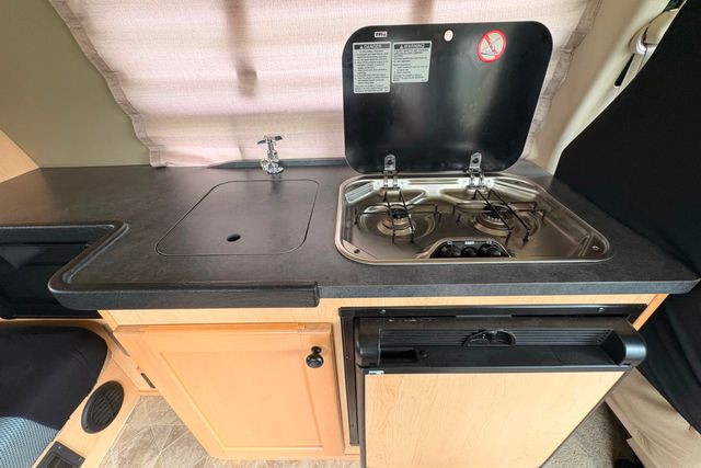 2010 Ford E-150 Custom Camper Conversion Raise Top Van | Roscoe, IL | Autoland Outlets