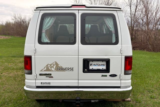 2010 Ford E-150 Custom Camper Conversion Raise Top Van | Roscoe, IL | Autoland Outlets 2010 Ford E-150 Custom Camper Conversion Raise Top Van | Roscoe, IL | Autoland Outlets