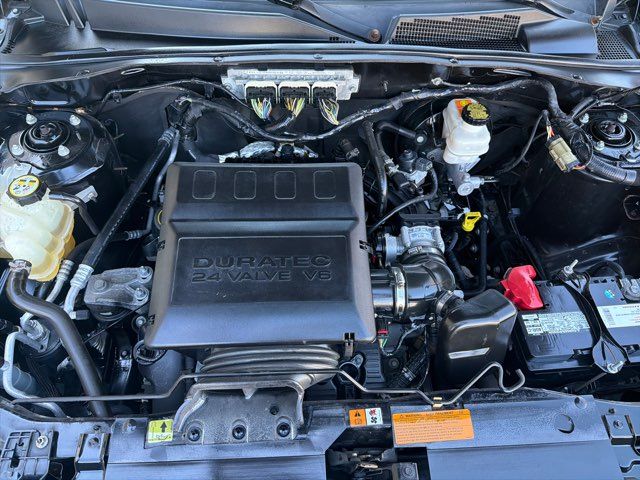 2010 Ford Escape Limited V6 4WD Imports and More Inc