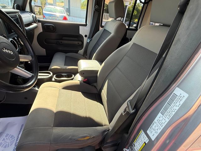 2010 Jeep Wrangler Unlimited WRAGLER SAHARA CLEAN CARFAX CERT | Plant City, FL | psv5 DEMO - Bayshore Automotive 2010 Jeep Wrangler Unlimited WRAGLER SAHARA CLEAN CARFAX CERT | Plant City, FL | psv5 DEMO - Bayshore Automotive