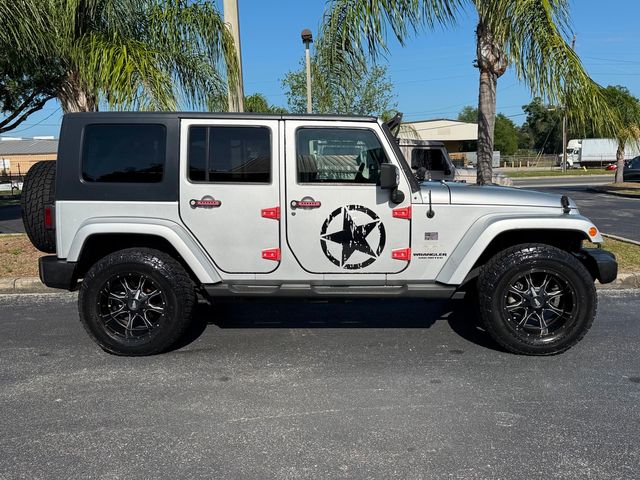 2010 Jeep Wrangler Unlimited WRAGLER SAHARA CLEAN CARFAX CERT | Plant City, FL | psv5 DEMO - Bayshore Automotive