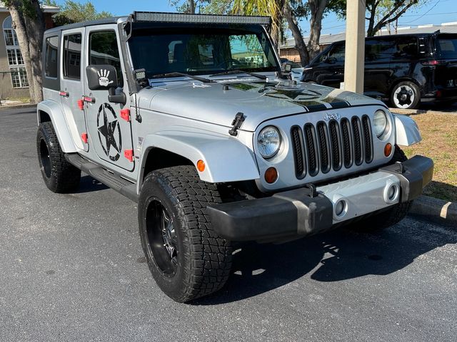2010 Jeep Wrangler Unlimited WRAGLER SAHARA CLEAN CARFAX CERT | Plant City Florida | Bayshore Automotive 