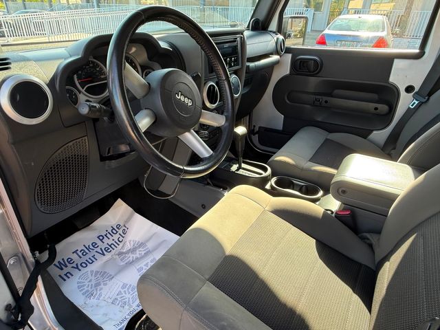 2010 Jeep Wrangler Unlimited WRAGLER SAHARA CLEAN CARFAX CERT | Plant City, FL | psv5 DEMO - Bayshore Automotive