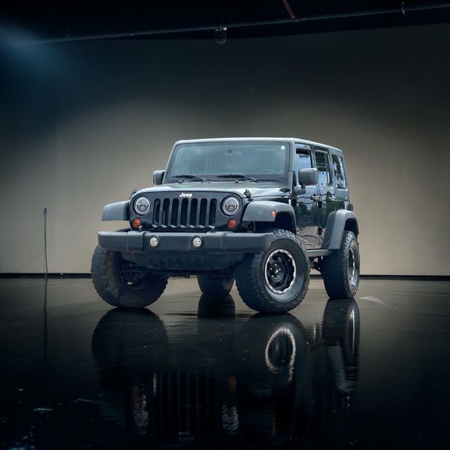 2012 Jeep Wrangler Unlimited Sport | Plano, TX | Schneck Motor Company 2012 Jeep Wrangler Unlimited Sport | Plano, TX | Schneck Motor Company