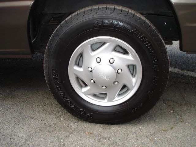 2013 Ford 15 Pass TV / DVD | Charlotte, North Carolina | ADVENTURE VANS