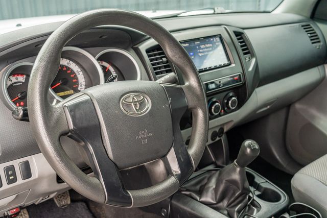 2013 Toyota Tacoma Base Regular Cab RWD / 2.7L / 5MT / CLEAN CARFAX | Austin, TX | Rocky Mountain Truck Stop Austin 2013 Toyota Tacoma Base Regular Cab RWD / 2.7L / 5MT / CLEAN CARFAX | Austin, TX | Rocky Mountain Truck Stop Austin