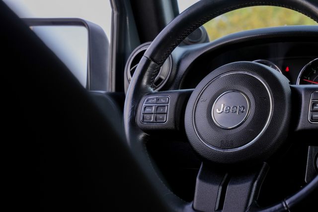 2014 Jeep Wrangler Unlimited Sport 4X4 6-SPEED W/ UPGRADES / REGULAR SERVICE | Dallas, TX | Rocky Mountain Truck Stop Dallas