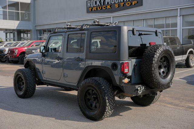 2014 Jeep Wrangler Unlimited Sport 4X4 6-SPEED W/ UPGRADES / REGULAR SERVICE | Dallas, TX | Rocky Mountain Truck Stop Dallas 2014 Jeep Wrangler Unlimited Sport 4X4 6-SPEED W/ UPGRADES / REGULAR SERVICE | Dallas, TX | Rocky Mountain Truck Stop Dallas