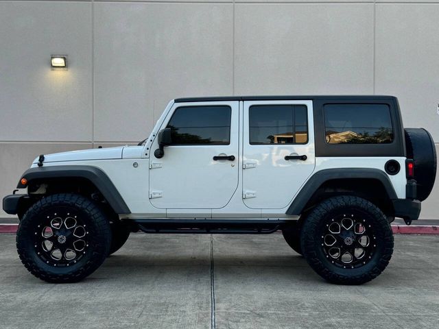 2014 Jeep Wrangler Unlimited Sport 4x4 4dr SUV | Houston, TX | Houston Auto Credit 2014 Jeep Wrangler Unlimited Sport 4x4 4dr SUV | Houston, TX | Houston Auto Credit