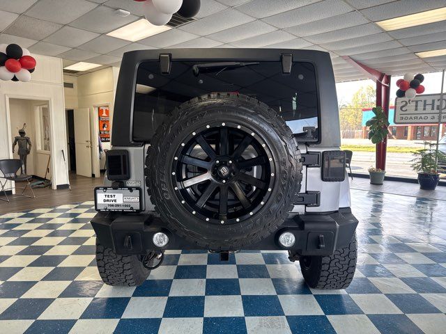 2014 Jeep Wrangler Unlimited Sahara | Rome, GA | Knight's Car Store 2014 Jeep Wrangler Unlimited Sahara | Rome, GA | Knight's Car Store