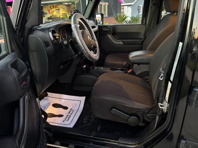 2015 Jeep Wrangler Unlimited Sport | Brea, CA | Zeus Auto Dealers