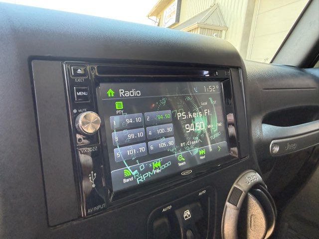 2015 Jeep Wrangler Unlimited Sport | Gifford, IL | Trav's Automotive