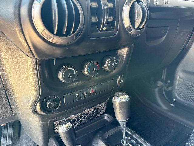 2015 Jeep Wrangler Unlimited Sport | Gifford, IL | Trav's Automotive