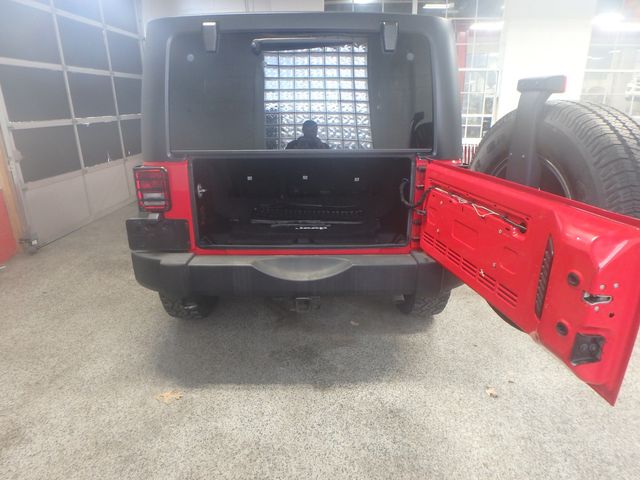 2015 Jeep Wrangler Unlimited Sport 6-spd manual- new water pump, a/c compressor, brakes,