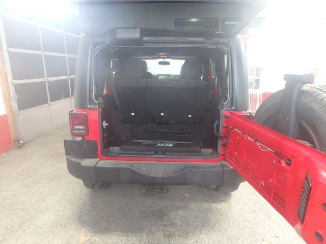 2015 Jeep Wrangler Unlimited Sport 6-spd manual- new water pump, a/c compressor, brakes,