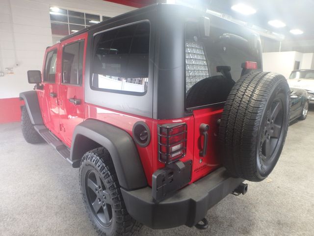 2015 Jeep Wrangler Unlimited Sport 6-spd manual- new water pump, a/c compressor, brakes,