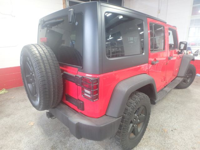 2015 Jeep Wrangler Unlimited Sport 6-spd manual- new water pump, a/c compressor, brakes,