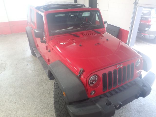 2015 Jeep Wrangler Unlimited Sport 6-spd manual- new water pump, a/c compressor, brakes,