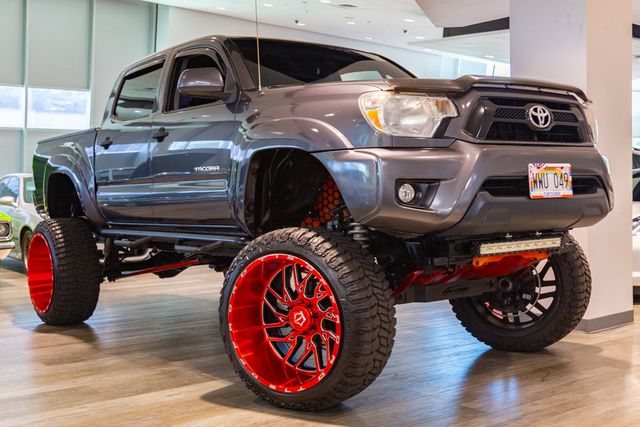 2015 Toyota Tacoma Lifted 12" TRD Sport at Autosource, photo 1