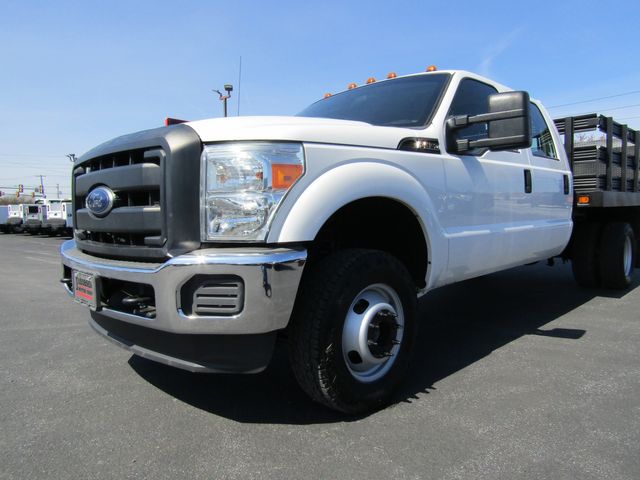2016 Ford F350 Crew Cab 4x4 with 10' Stake Body and Lift Gate