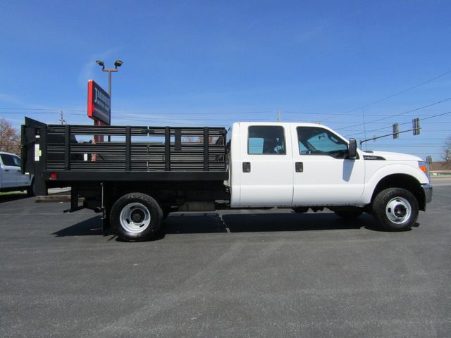 2016 Ford F350 Crew Cab 4x4 with 10' Stake Body and Lift Gate