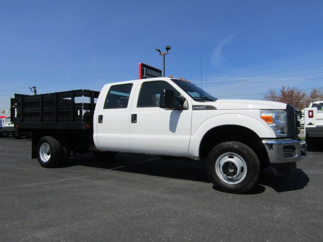 2016 Ford F350 Crew Cab 4x4 with 10' Stake Body and Lift Gate