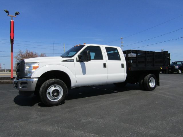 2016 Ford F350 Crew Cab 4x4 with 10' Stake Body and Lift Gate