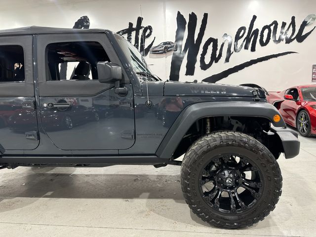 2016 Jeep Wrangler Unlimited Willys Wheeler, 430 Radio, Max Tow, Fuel 20's-35's | Dallas, Texas | Corvette Warehouse 2016 Jeep Wrangler Unlimited Willys Wheeler, 430 Radio, Max Tow, Fuel 20's-35's | Dallas, Texas | Corvette Warehouse