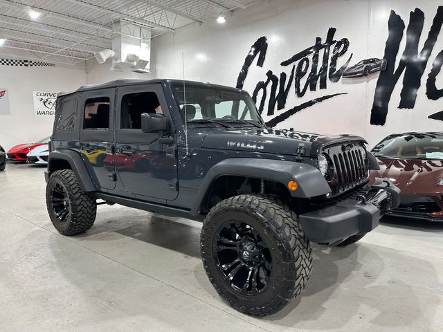 2016 Jeep Wrangler Unlimited Willys Wheeler, 430 Radio, Max Tow, Fuel 20's-35's | Dallas, Texas | Corvette Warehouse 2016 Jeep Wrangler Unlimited Willys Wheeler, 430 Radio, Max Tow, Fuel 20's-35's | Dallas, Texas | Corvette Warehouse