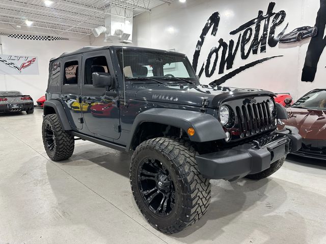 2016 Jeep Wrangler Unlimited Willys Wheeler, 430 Radio, Max Tow, Fuel 20's-35's | Dallas, Texas | Corvette Warehouse 2016 Jeep Wrangler Unlimited Willys Wheeler, 430 Radio, Max Tow, Fuel 20's-35's | Dallas, Texas | Corvette Warehouse