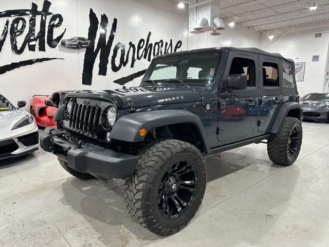 2016 Jeep Wrangler Unlimited Willys Wheeler, 430 Radio, Max Tow, Fuel 20's-35's | Dallas, Texas | Corvette Warehouse 2016 Jeep Wrangler Unlimited Willys Wheeler, 430 Radio, Max Tow, Fuel 20's-35's | Dallas, Texas | Corvette Warehouse