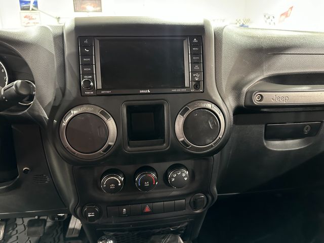 2016 Jeep Wrangler Unlimited Willys Wheeler, 430 Radio, Max Tow, Fuel 20's-35's | Dallas, Texas | Corvette Warehouse 2016 Jeep Wrangler Unlimited Willys Wheeler, 430 Radio, Max Tow, Fuel 20's-35's | Dallas, Texas | Corvette Warehouse