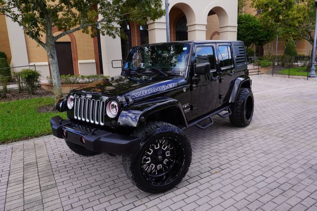 2017 Jeep WRANGLER UNLIMITED SAHARA CUSTOM LIFTED NAV LEATHER 22" | Tampa, FL | Florida Auto Sales Group 2017 Jeep WRANGLER UNLIMITED SAHARA CUSTOM LIFTED NAV LEATHER 22" | Tampa, FL | Florida Auto Sales Group