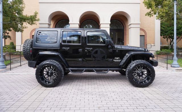 2017 Jeep WRANGLER UNLIMITED SAHARA CUSTOM LIFTED NAV LEATHER 22" | Tampa, FL | Florida Auto Sales Group 2017 Jeep WRANGLER UNLIMITED SAHARA CUSTOM LIFTED NAV LEATHER 22" | Tampa, FL | Florida Auto Sales Group