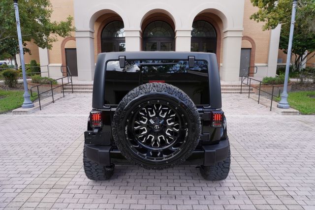 2017 Jeep WRANGLER UNLIMITED SAHARA CUSTOM LIFTED NAV LEATHER 22" | Tampa, FL | Florida Auto Sales Group 2017 Jeep WRANGLER UNLIMITED SAHARA CUSTOM LIFTED NAV LEATHER 22" | Tampa, FL | Florida Auto Sales Group