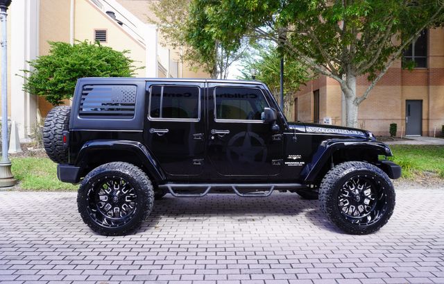 2017 Jeep WRANGLER UNLIMITED SAHARA CUSTOM LIFTED NAV LEATHER 22" | Tampa, FL | Florida Auto Sales Group 2017 Jeep WRANGLER UNLIMITED SAHARA CUSTOM LIFTED NAV LEATHER 22" | Tampa, FL | Florida Auto Sales Group