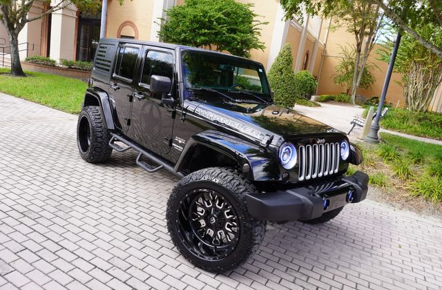 2017 Jeep WRANGLER UNLIMITED SAHARA CUSTOM LIFTED NAV LEATHER 22" | Tampa, FL | Florida Auto Sales Group 2017 Jeep WRANGLER UNLIMITED SAHARA CUSTOM LIFTED NAV LEATHER 22" | Tampa, FL | Florida Auto Sales Group