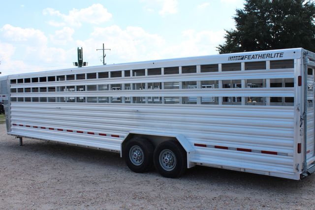 2022 Featherlite 8127 - 32' GN Livestock, 2 Cut Gates w/ sliders, Tandem 8Ks | CONROE, TX | SportChassis/ Featherlite Trailers of Texas 2022 Featherlite 8127 - 32' GN Livestock, 2 Cut Gates w/ sliders, Tandem 8Ks | CONROE, TX | SportChassis/ Featherlite Trailers of Texas