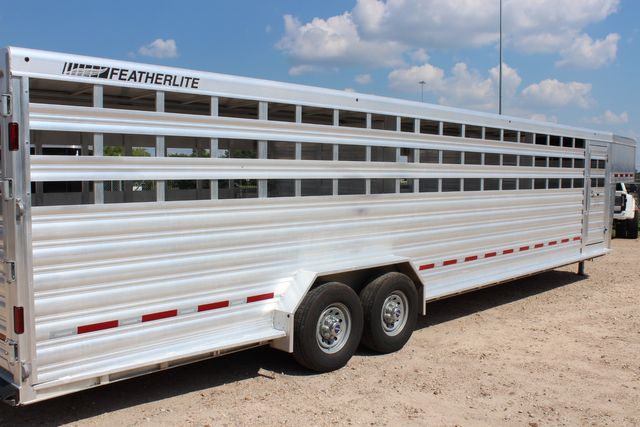 2022 Featherlite 8127 - 32' GN Livestock, 2 Cut Gates w/ sliders, Tandem 8Ks | CONROE, TX | SportChassis/ Featherlite Trailers of Texas 2022 Featherlite 8127 - 32' GN Livestock, 2 Cut Gates w/ sliders, Tandem 8Ks | CONROE, TX | SportChassis/ Featherlite Trailers of Texas