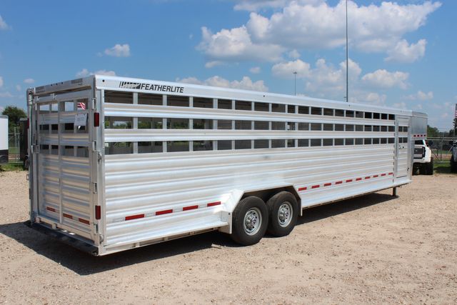 2022 Featherlite 8127 - 32' GN Livestock, 2 Cut Gates w/ sliders, Tandem 8Ks | CONROE, TX | SportChassis/ Featherlite Trailers of Texas 2022 Featherlite 8127 - 32' GN Livestock, 2 Cut Gates w/ sliders, Tandem 8Ks | CONROE, TX | SportChassis/ Featherlite Trailers of Texas