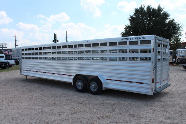 2022 Featherlite 8127 - 32' GN Livestock, 2 Cut Gates w/ sliders, Tandem 8Ks | CONROE, TX | SportChassis/ Featherlite Trailers of Texas 2022 Featherlite 8127 - 32' GN Livestock, 2 Cut Gates w/ sliders, Tandem 8Ks | CONROE, TX | SportChassis/ Featherlite Trailers of Texas